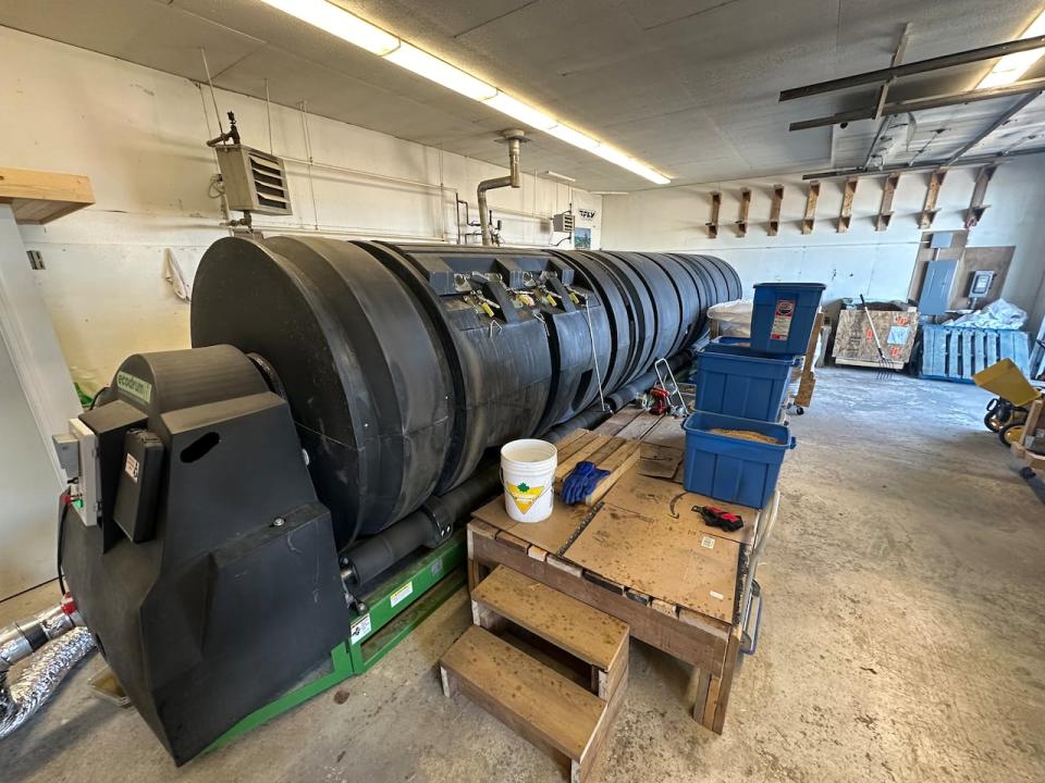 A huge cylindrical composter, tucked inside a building in the Kam Lake industrial rea, is a key component of Gignac's business.