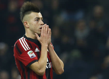 AC Milan's Stephan El Shaarawy reacts after missing a goal opportunity against Inter Milan during their Italian Serie A soccer match at the San Siro stadium in Milan November 23, 2014. REUTERS/Alessandro Garofalo