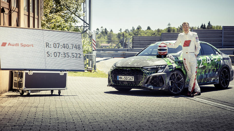 Frank Stippler with the Audi RS3 after his record-breaking lap. - Credit: Audi