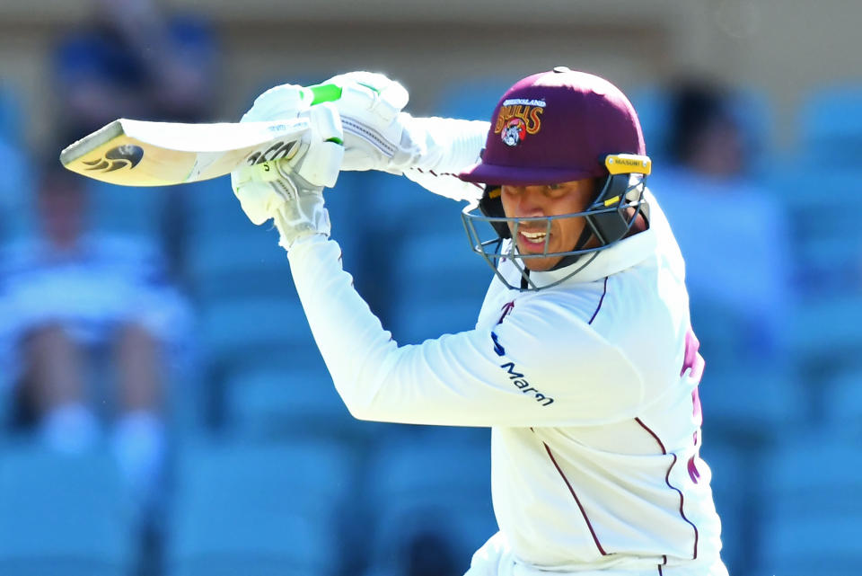 Usman Khawaja (pictured) playing a cover drive during a Sheffield Shield match.