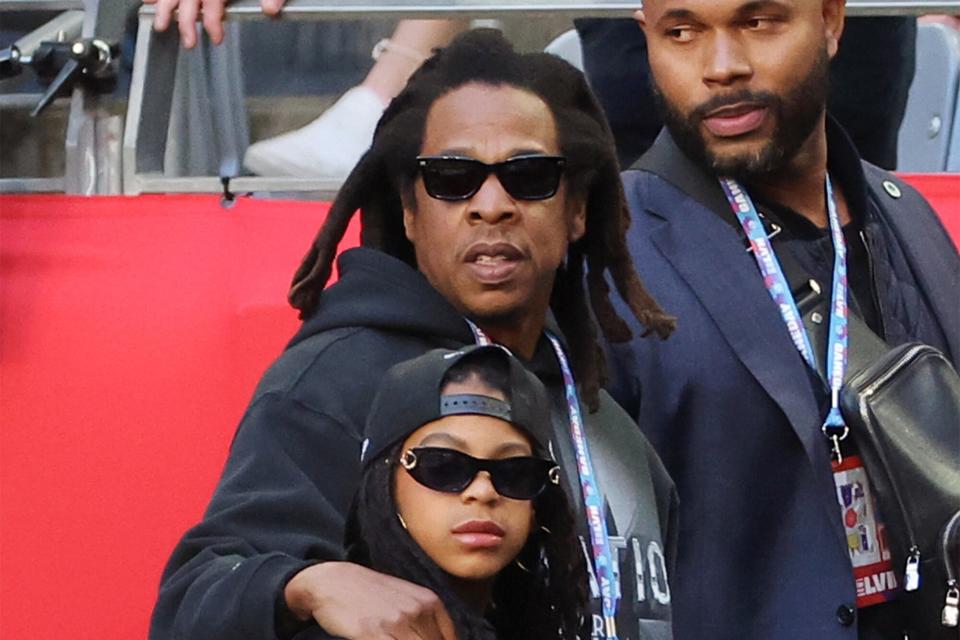 Jay-Z and Blue Ivy Carter attend the Super Bowl LVII Pregame at State Farm Stadium on February 12, 2023 in Glendale, Arizona.