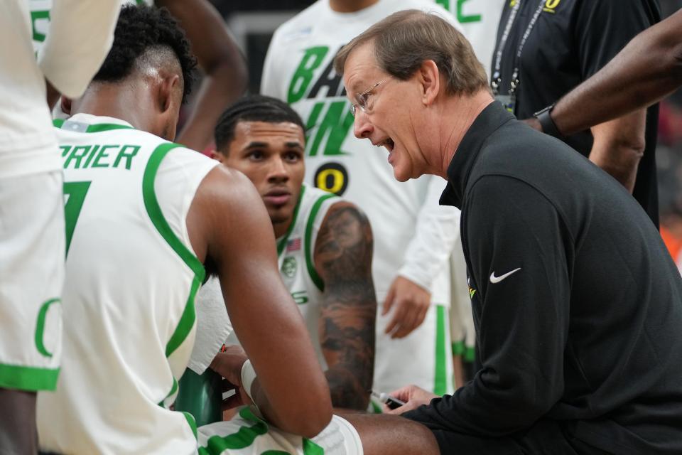 Oregon head coach Dana Altman talks to his team during a timeout against Oregon State at T-Mobile Arena in Las Vegas on March 9.