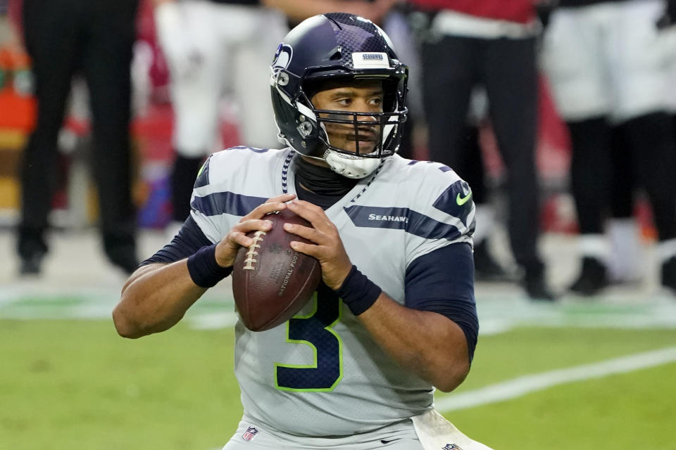 Seattle Seahawks quarterback Russell Wilson (3) looks to pass against the Arizona Cardinals during the first half of an NFL football game, Sunday, Oct. 25, 2020, in Glendale, Ariz. (AP Photo/Rick Scuteri)