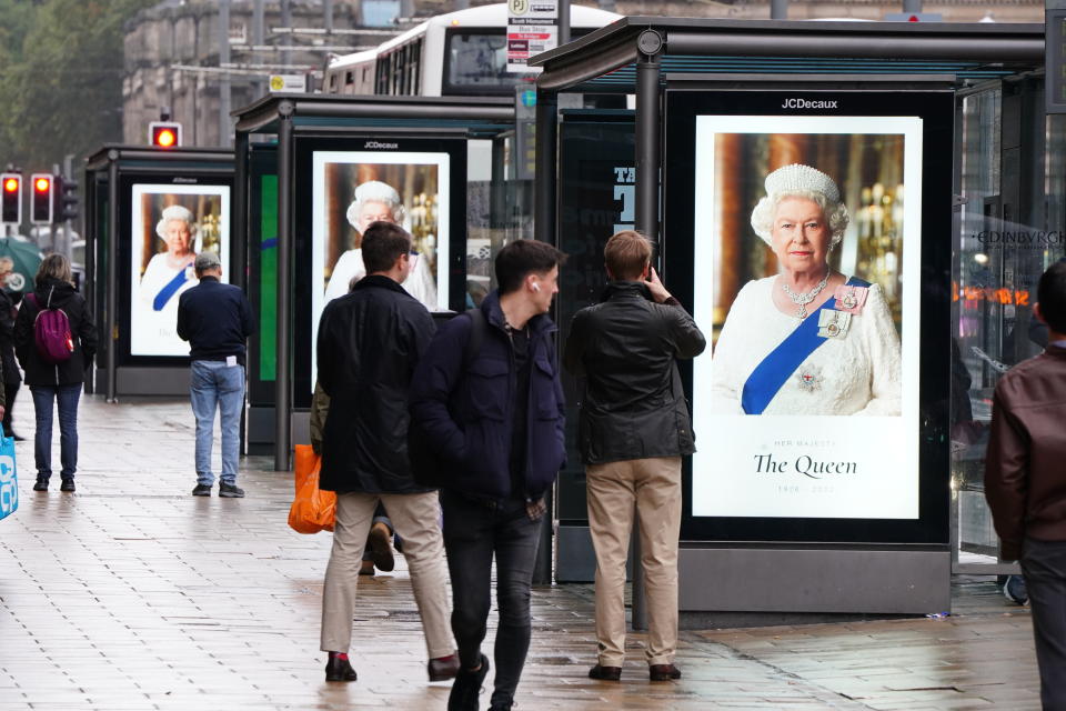 Tributes to Queen Elizabeth II on bus stops on Princes Street in Edinburgh following the death of Queen Elizabeth II on Thursday. Picture date: Friday September 9, 2022.