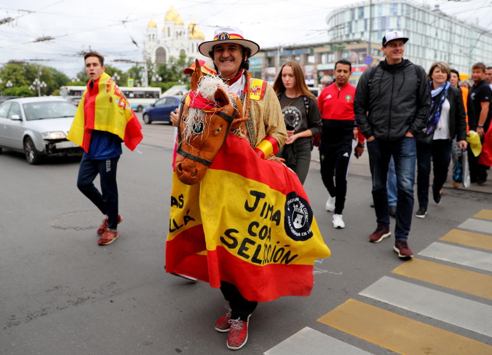 <p>Spain fans arrive in style for their final group game </p>