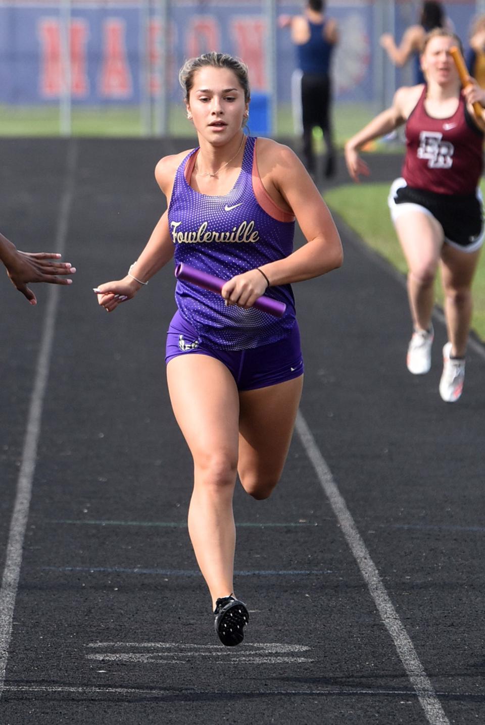 Fowlerville's Sarah Litz won both hurdles events and was on a winning relay in the regional track and field meet in Williamston.