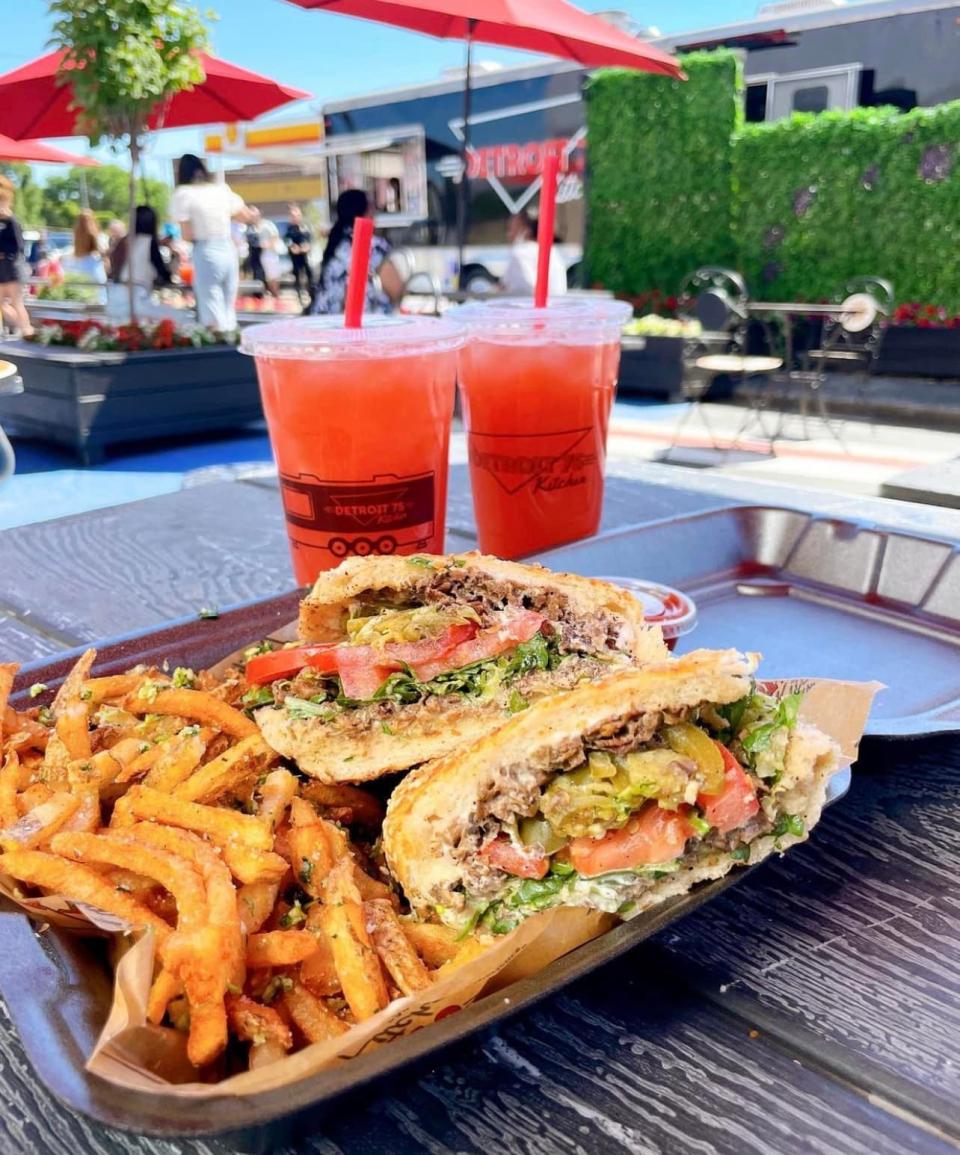 A sandwich and fries at Detroit 75 Kitchen.