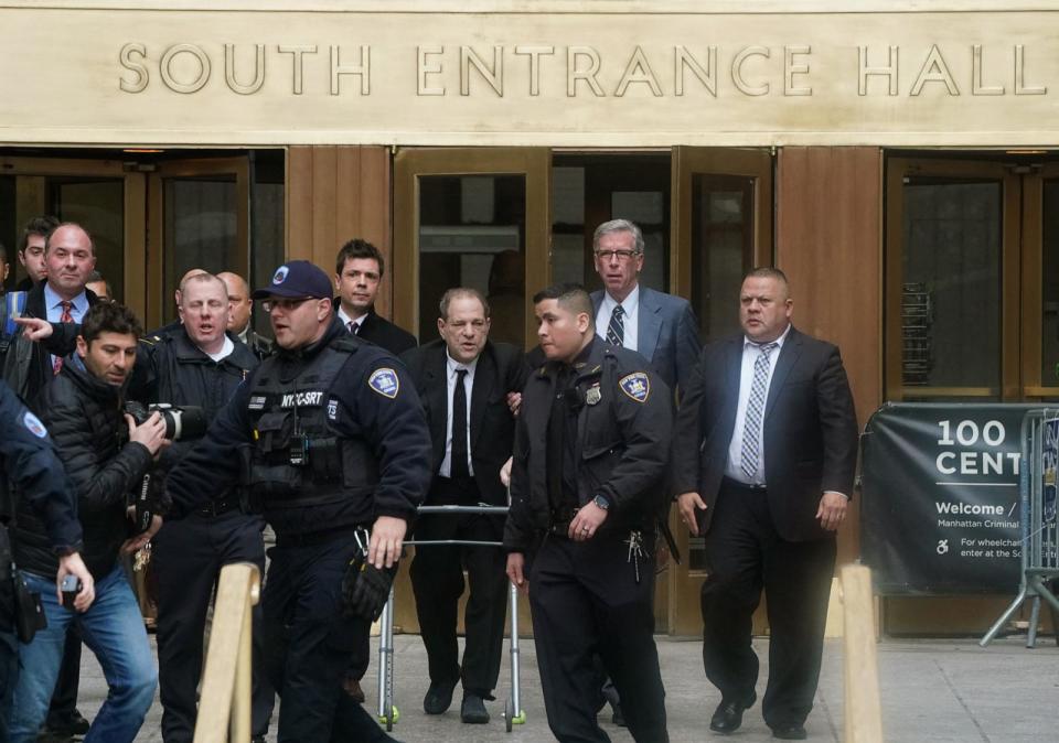 PHOTO: In this Jan. 6, 2020, file photo, Harvey Weinstein uses a walker as he leaves the Manhattan Criminal Court, in New York. (Timothy A. Clary/AFP via Getty Images, FILE)