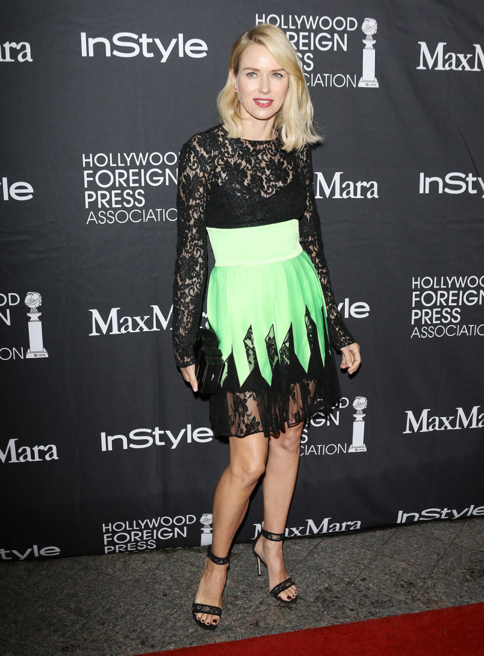Naomi Watts: In a lacy black dress with green overlay at the InStyle party. 