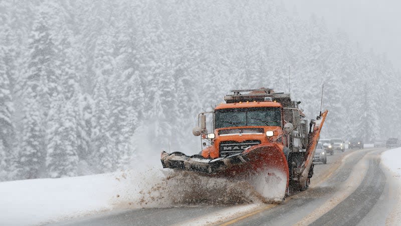 A UDOT snowplow clears the road in Big Cottonwood Canyon on Feb. 9. More mountain snow is in Utah's forecast this Easter weekend.