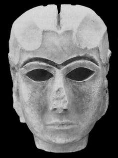 <span class="caption">The Mask of Warka, one of the earliest representations of a human face, was recovered in Iraq after being stolen from the National Museum in Baghdad during the 2003 US invasion.</span>