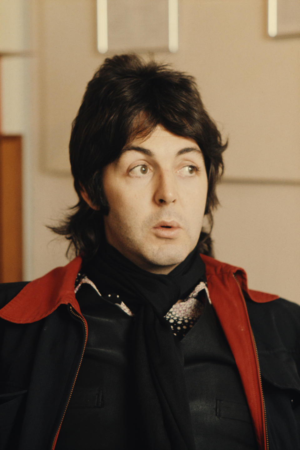 McCartney sitting, posing for a portrait in 1975