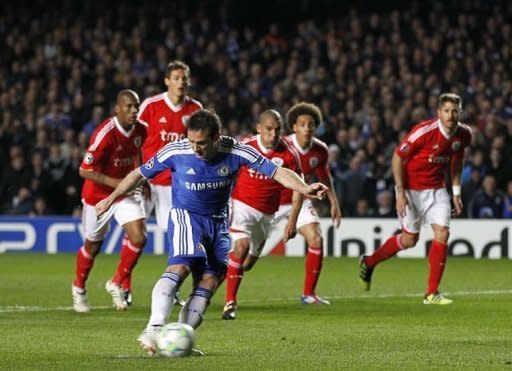 Chelsea's Frank Lampard scores a penalty against Benfica during their UEFA Champions League quarter finals football match at Stamford Bridge, West London. Chelsea survived a nervous finale against 10-man Benfica to earn a 2-1 win in the Champions League quarter-final second leg and set up a last-four showdown with holders Barcelona