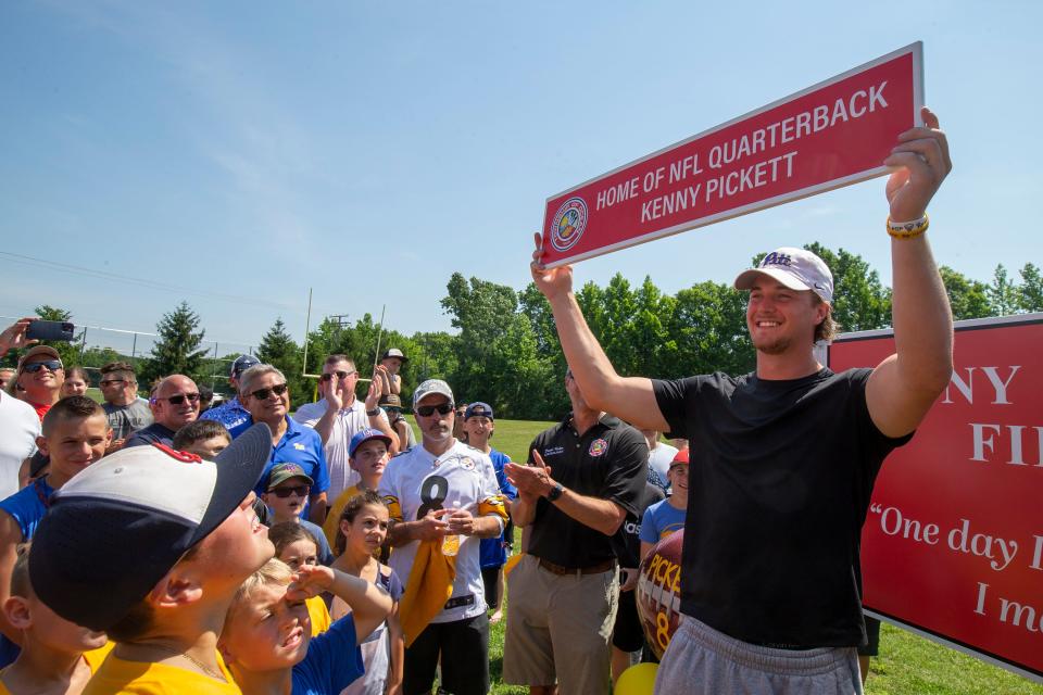 Former Ocean Township quarterback Kenny Pickett, taken in the first round of the NFL Draft in April by the Pittsburgh Steelers after playing at Pitt, attends the Kenny Pickett field dedication ceremony at the Ocean's AYF practice field, which is now named in his honor, in Ocean Twp., NJ Friday, July 1, 2022.