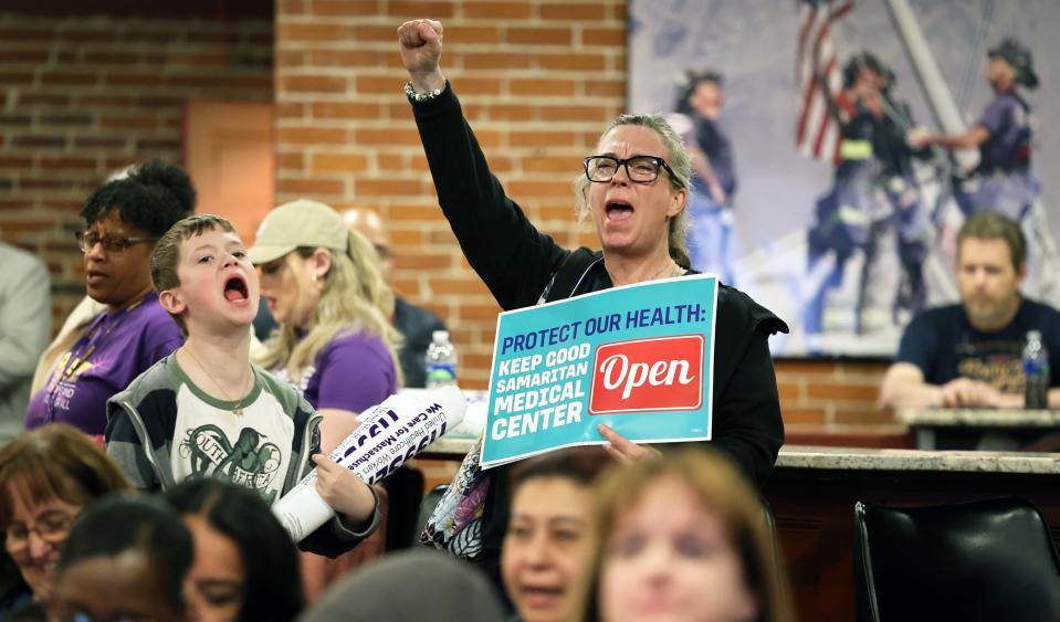 Dawn Hebert-Miller, a registered Nurse at Good Samaritan Medical Center in Brockton, and her son Devon Hebert-Miller, 10, attend a community rally at Keating Hall on Wednesday, April 24, 2024, to keep Good Sam open amid the financial crisis enveloping its owner, Steward Health Care.