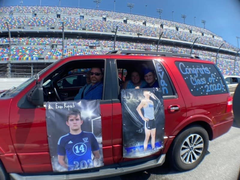 Families decorated their cars to honor graduates. (Photo: Jeff Reaves)