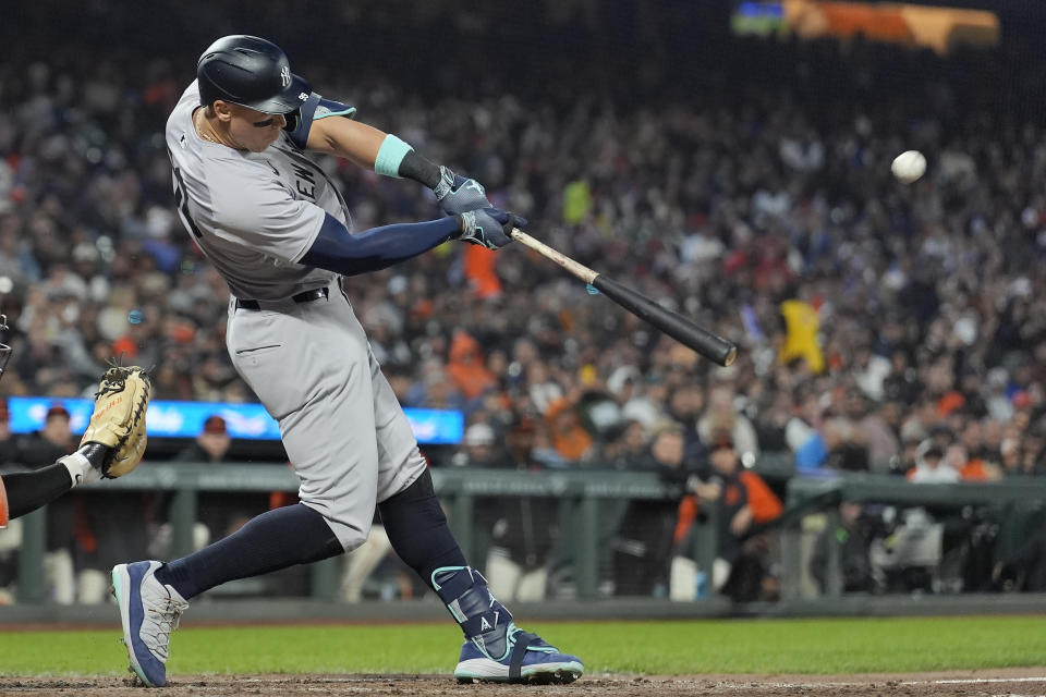 New York Yankees' Aaron Judge hits a home run against the San Francisco Giants during the sixth inning of a baseball game in San Francisco, Friday, May 31, 2024. (AP Photo/Jeff Chiu)
