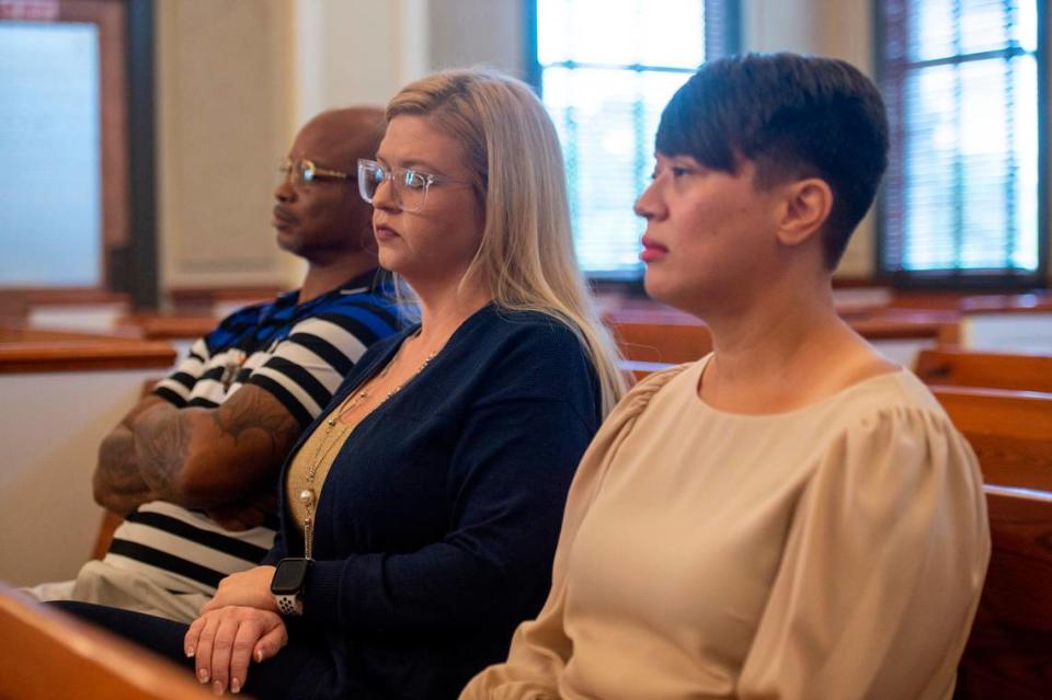 Ben Taylor’s ex-girlfriend Branissa Stroud, center, and Taylor’s wife Dorean Taylor, right, sit in on a court hearing for Taylor’s case against DHS at Hancock County Chancery Court in Bay St. Louis on Monday, Sept. 12, 2022. Taylor failed to show up for court.