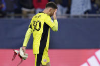 New England Revolution goalkeeper Matt Turner walks off the pitch after the team's 3-2 loss to New York City FC in an MLS playoff soccer match, Tuesday, Nov. 30, 2021, in Foxborough, Mass. (AP Photo/Charles Krupa)