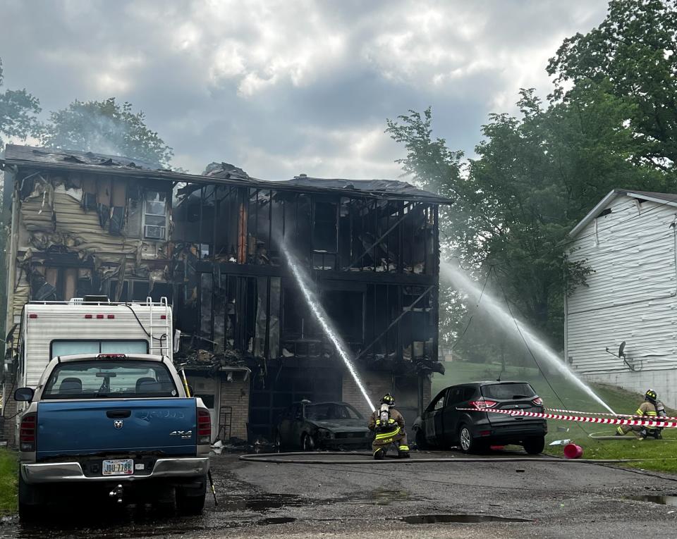 Firefighters battled a blaze Saturday afternoon at a duplex on Millvale Avenue NE in Plain Township. No one was injured.