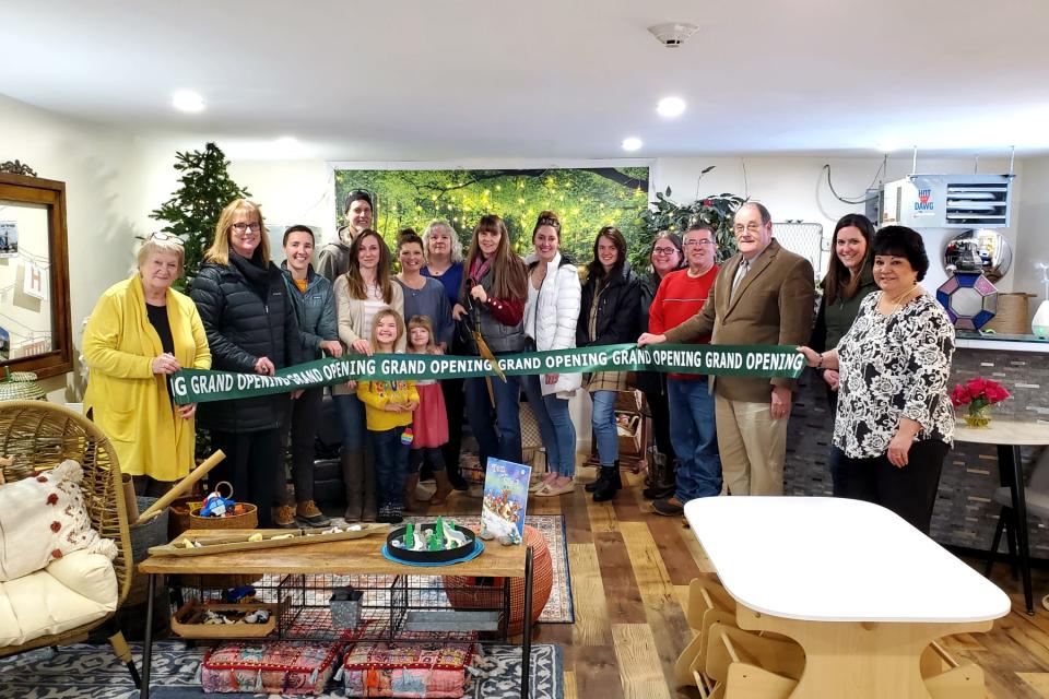 NH State Rep. Anne Grassie, Chamber of Commerce board members Sharla Rollins of First Seacoast Bank, Lauren Jerr of R.W. Creteau Technology Center at Spaulding High School, Return to Roots Learning Community Executive Director Donna Johnson cutting the ribbon, along with Co-Director Amber Baud, and Kelly Rand. Return to Roots board members, Dawn Crawford Collins, Brianna Moynihan-Sienkiewicz, and Michelle Mcewen. Chamber board members, Caitlyn Turgeon of HBL Insurance, Kendall Spewock of Admiral Property LLC, David Stevens of Century 21 Northeast, State Senator and City Councilor James Gray, and Chamber President Laura Ring.