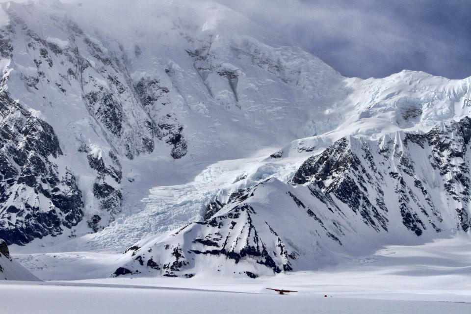 FILE - In this April 24, 2016, file photo, an airplane prepares to take off from an area where a base camp was being set up for climbers to begin their ascent of Denali near Talkeetna, Alaska. Talkeetna businesses are suffering in the financial pinch caused by the coronavirus, which led to the national park canceling this year's climbing season and the cancelation of summer seasons by most major cruise companies, meaning nearly half of Alaska's 2.2 million visitors had their trips canceled this year. (AP Photo/Mark Thiessen, File)