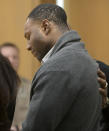 Torrey Green reacts as a jury finds him guilty of eight charges including five counts of rape and a charge sexual battery in connection to reports from six women accusing him of sexual assault while he was a football player at Utah State University, Friday, Jan.18, 2019 in Brigham City, Utah. (Eli Lucero/Herald Journal via AP, Pool)