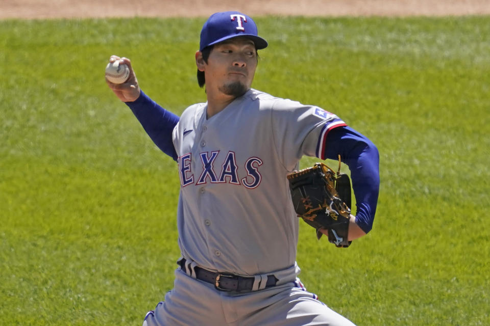 Texas Rangers starting pitcher Kohei Arihara, of Japan, throws against the Chicago White Sox during the first inning of a baseball game in Chicago, Sunday, April 25, 2021. (AP Photo/Nam Y. Huh)