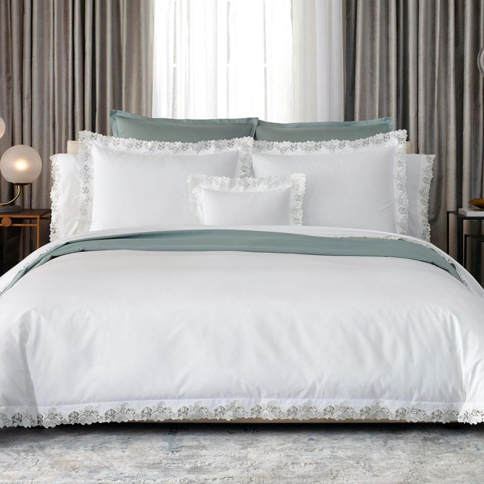 Matouk Virginia Bedding Collection on a bed.