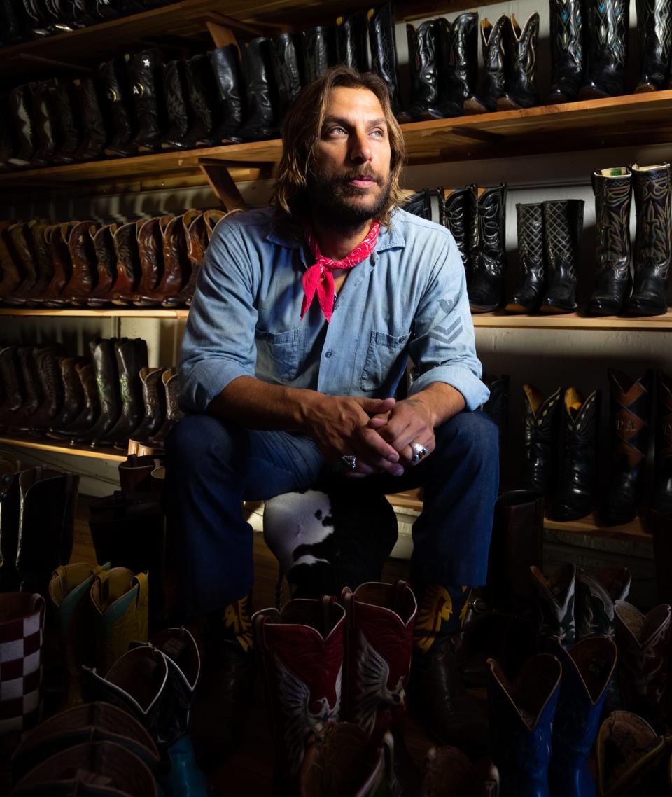 Full Circle Vintage Owner and boot-finder Joey Medina in his Lockhart shop, June 30, 2023. Medina travels across Texas and the United States collecting vintage cowboy boots to repair and resell, giving them a second life and preserving Texas history. "When I find an old vintage pair of boots, I always have the idea and the thought, 'If only boots could tell a story,'" said Medina. "With all the distressing and the wear, I just wonder what happened."