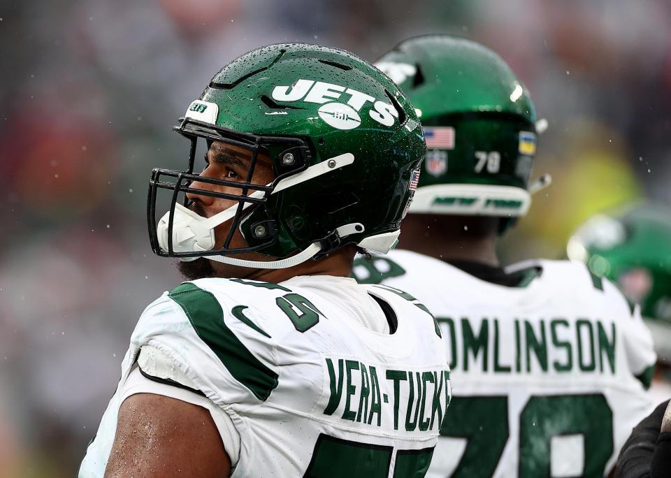 EAST RUTHERFORD, NEW JERSEY – SEPTEMBER 24: Alijah Vera-Tucker #75 of the New York Jets looks on from the sideline in the second half against the New England Patriots at MetLife Stadium on September 24, 2023 in East Rutherford, New Jersey. (Photo by Elsa/Getty Images)