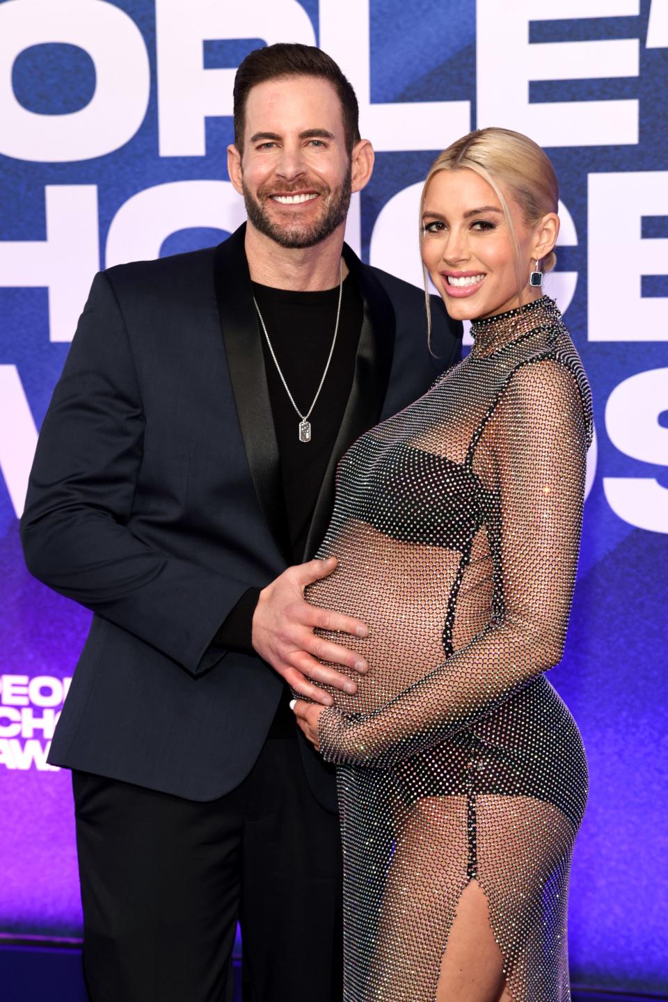 arek El Moussa and Heather Rae Young arrive to the 2022 People's Choice Awards held at the Barker Hangar on December 6, 2022.