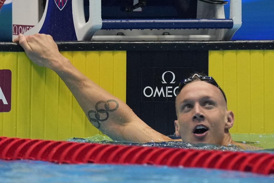 Caeleb Dressel reacts after the men's 100 butterfly semifinals heat Friday, June 21, 2024, at the US Swimming Olympic Trials in Indianapolis. (AP Photo/Michael Conroy)