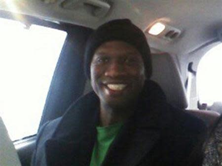 Aaron Alexis, who the FBI believe to be responsible for the September 16, 2013 shootings at the Washington Navy Yard in Washington, D.C., is shown in this undated handout photograph provided by Kristi Suthamtewakul, wife of "Happy Bowl" Thai restaurant owner Nutpisit Suthamtewakul, was best friends with Alexis when he lived in White Settlement, Texas. REUTERS/Kristi Suthamtewakul/Handout via Reuters