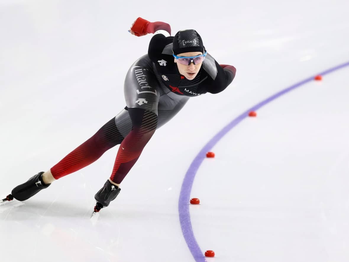 Canada's Ivanie Blondin, shown in this file photo in the final of World Cup speedskating in 2020, won the women's 1,500m event at the Canadian long track speed skating championships in Calgary. (Peter Dejong/The Associated Press - image credit)