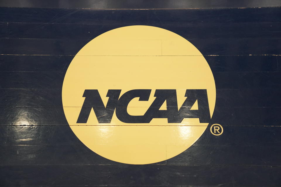 The NCAA logo on the floor during a Atlantic 10 Women's Basketball Tournament