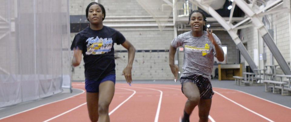 Between them, high school runners Andraya Yearwood (right) and Terry Miller (left) won 15 Connecticut girls' track titles from 2017 to 2019. A federal judge threw out a lawsuit that challenged the state athletic association rules that allowed them to compete.