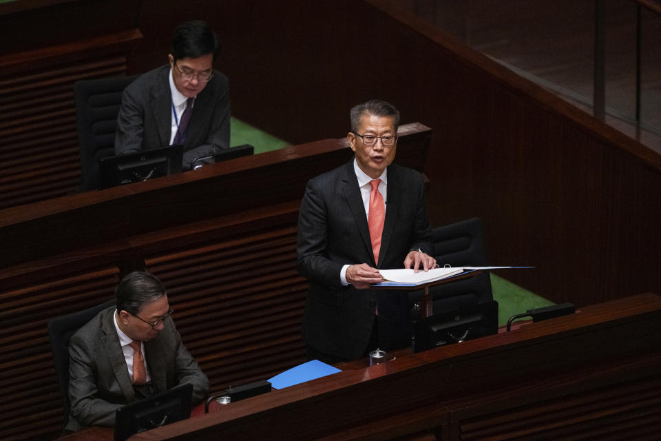 Hong Kong's Finance Secretary Paul Chan delivers the annual budget address at the Legislative Council in Hong Kong, Wednesday, Feb. 28, 2024. (AP Photo/Louise Delmotte)