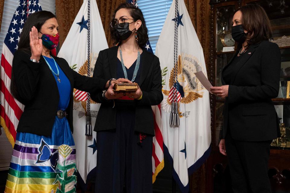 Vice President Kamala Harris (R) swears in Interior Secretary Deb Haaland on March 18, 2021, at the Eisenhower Executive Office Building Ceremonial Office in Washington, D.C.