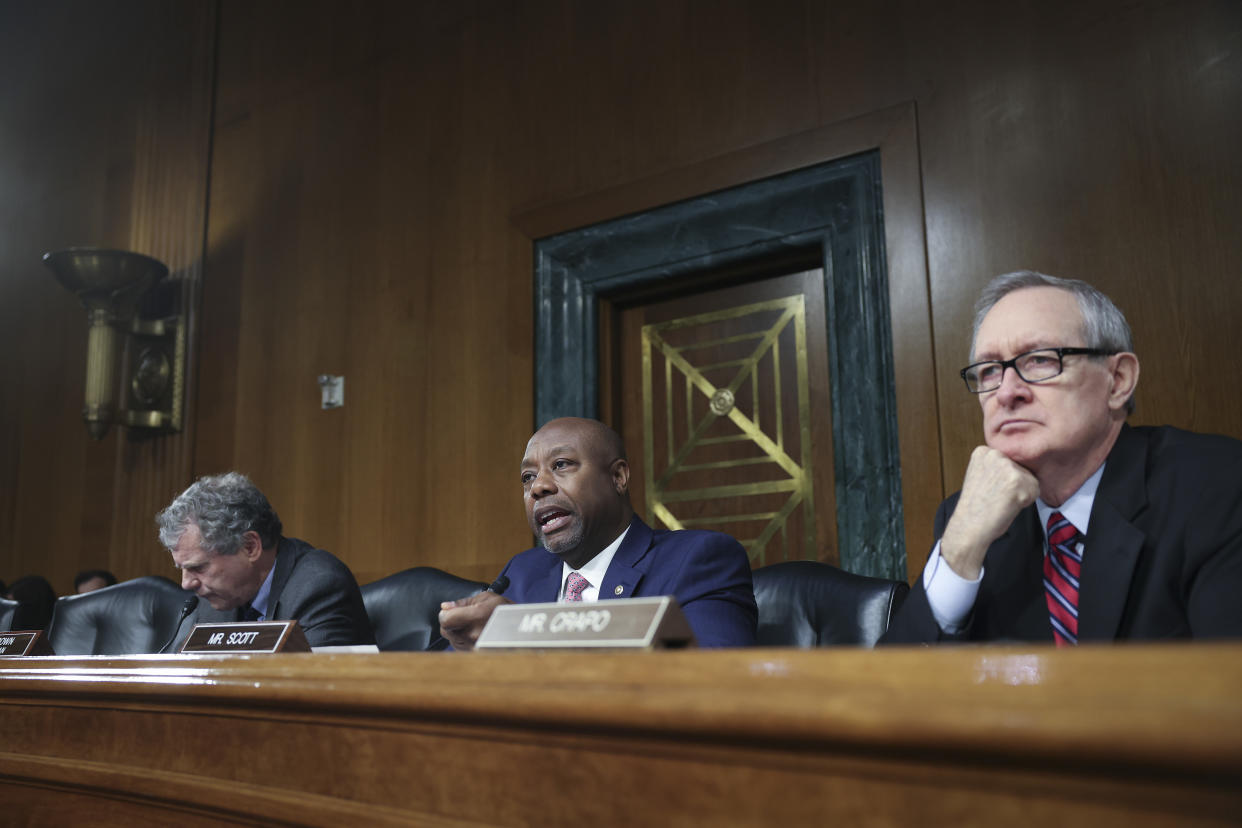 WASHINGTON, DC - MARCH 28:  Ranking member Sen. Tim Scott (C) (R-SC) asks questions during a hearing of the Senate Banking, Housing and Urban Affairs Committee March 28, 2023 in Washington, DC. The committee heard testimony on the topic of 