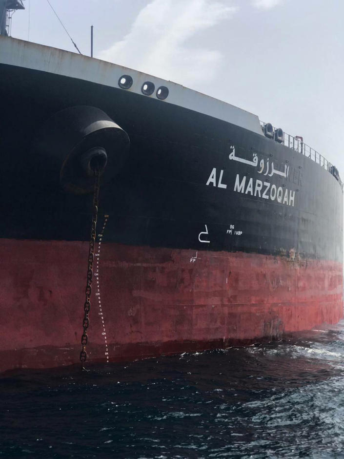 This photo provided by the United Arab Emirates' National Media Council shows the Saudi-flagged oil tanker Al Marzoqah off the coast of Fujairah, United Arab Emirates, Monday, May 13, 2019. Two Saudi oil tankers and a Norwegian-flagged vessel were damaged in what Gulf officials described Monday as a "sabotage" attack off the coast of the United Arab Emirates. While details of the incident remain unclear, it raised risks for shippers in a region vital to global energy supplies at a time of increasing tensions between the U.S. and Iran over its unraveling nuclear deal with world powers. (United Arab Emirates National Media Council via AP)