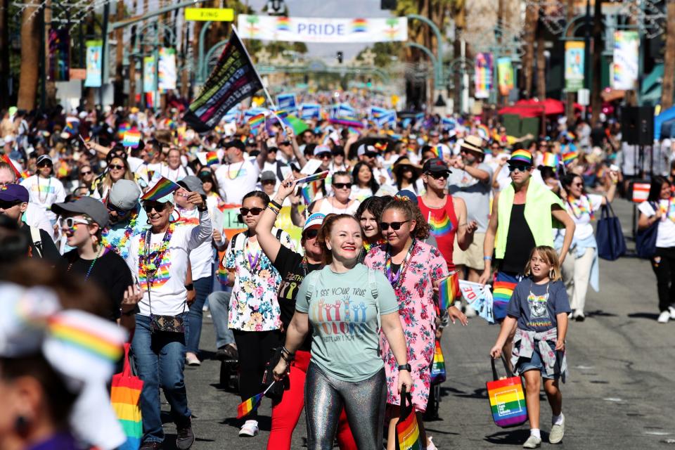 Thousands of people gather on Palm Canyon Drive during the Greater Palm Springs Pride Parade in downtown Palm Springs, Calif., on Sunday, Nov. 6, 2022. 