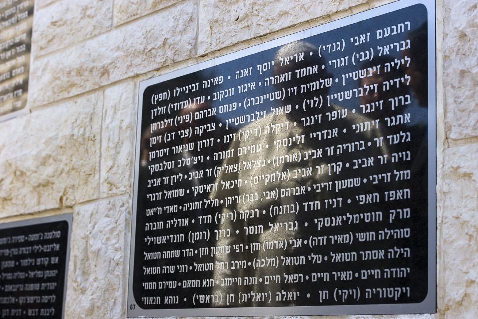 Pope Francis is reflected in an inscription at the Memorial to the Victims of Terror in Jerusalem