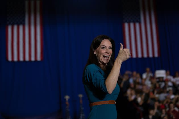 Republican gubernatorial candidate Tudor Dixon gives a thumbs up during a 