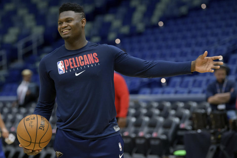 New Orleans Pelicans forward Zion Williamson (1) practices before an NBA basketball game between the New Orleans Pelicans and the Los Angeles Clippers in New Orleans, Saturday, Jan. 18, 2020. Williamson is expected to return to play Wednesday against the San Antonio Spurs. (AP Photo/Matthew Hinton)