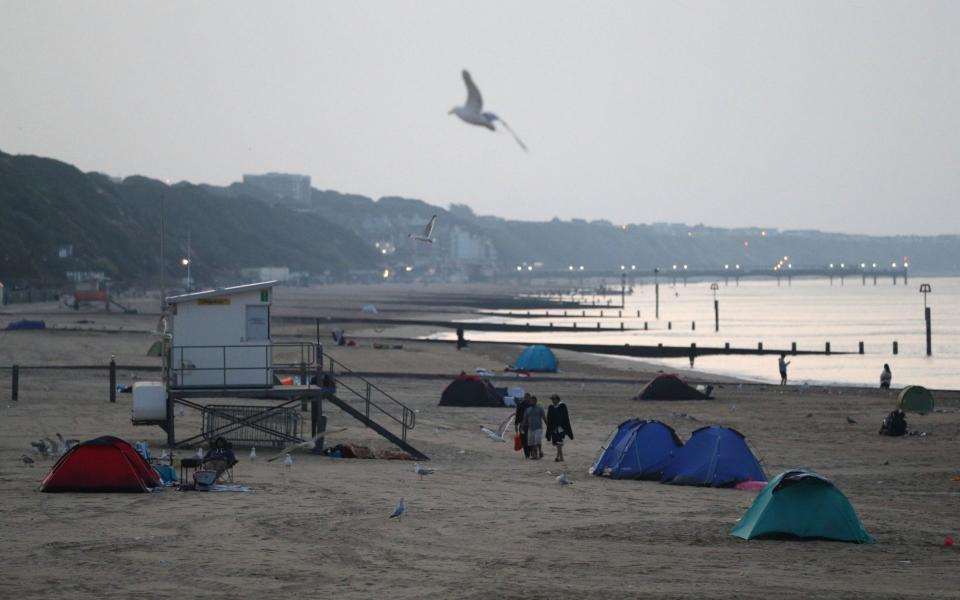 Tents pitched up on Bournemouth beach in Dorset. PA Photo - PA