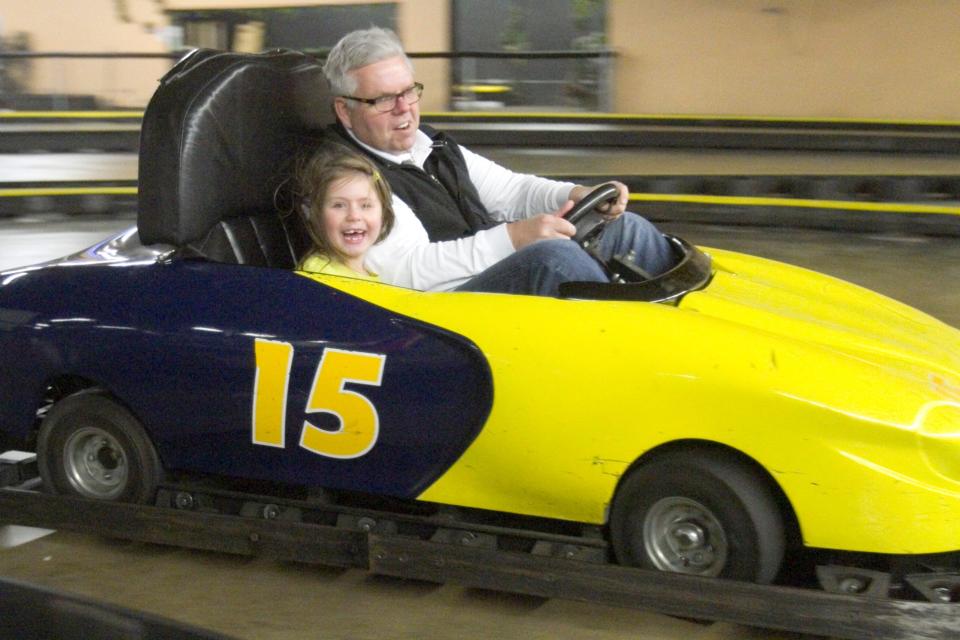 Then-6-year-old Olivia Nelson gets a thrill ride from her dad and local dentist, Dr. Wayne Nelson at Great Escape Family Fun Center in Genoa Township on New Year's Eve of 2013.