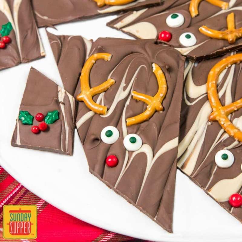 <p>Sunday Supper Movement</p><p>This bark recipe is one of the easiest homemade candies you can make during the holidays and a tasty dessert option to add to your buffet!</p><p><strong>Get the recipe: </strong><a href="https://sundaysuppermovement.com/christmas-bark-recipe/" rel="nofollow noopener" target="_blank" data-ylk="slk:Reindeer Christmas Bark;elm:context_link;itc:0;sec:content-canvas" class="link "><strong>Reindeer Christmas Bark</strong></a></p>
