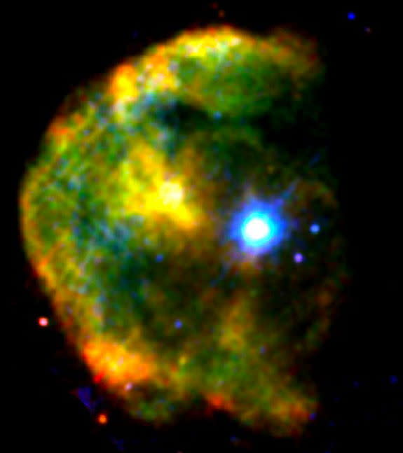 The magnetar 1E 2259+586 shines a brilliant blue-white in this false-color X-ray image of the CTB 109 supernova remnant, which lies about 10,000 light-years away toward the constellation Cassiopeia. X-rays at low, medium and high energies are r