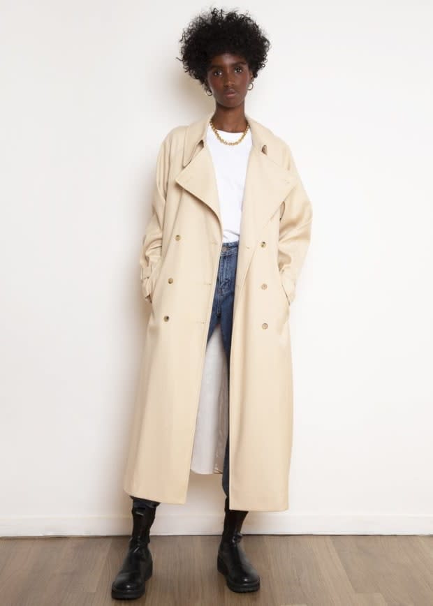 <p>The Frankie Shop Classic Woven Trench Coat in Buff, $395, <a href="https://thefrankieshop.com/collections/outerwear/products/classic-woven-trench-in-buff" rel="nofollow noopener" target="_blank" data-ylk="slk:available here;elm:context_link;itc:0;sec:content-canvas" class="link ">available here</a>. </p>